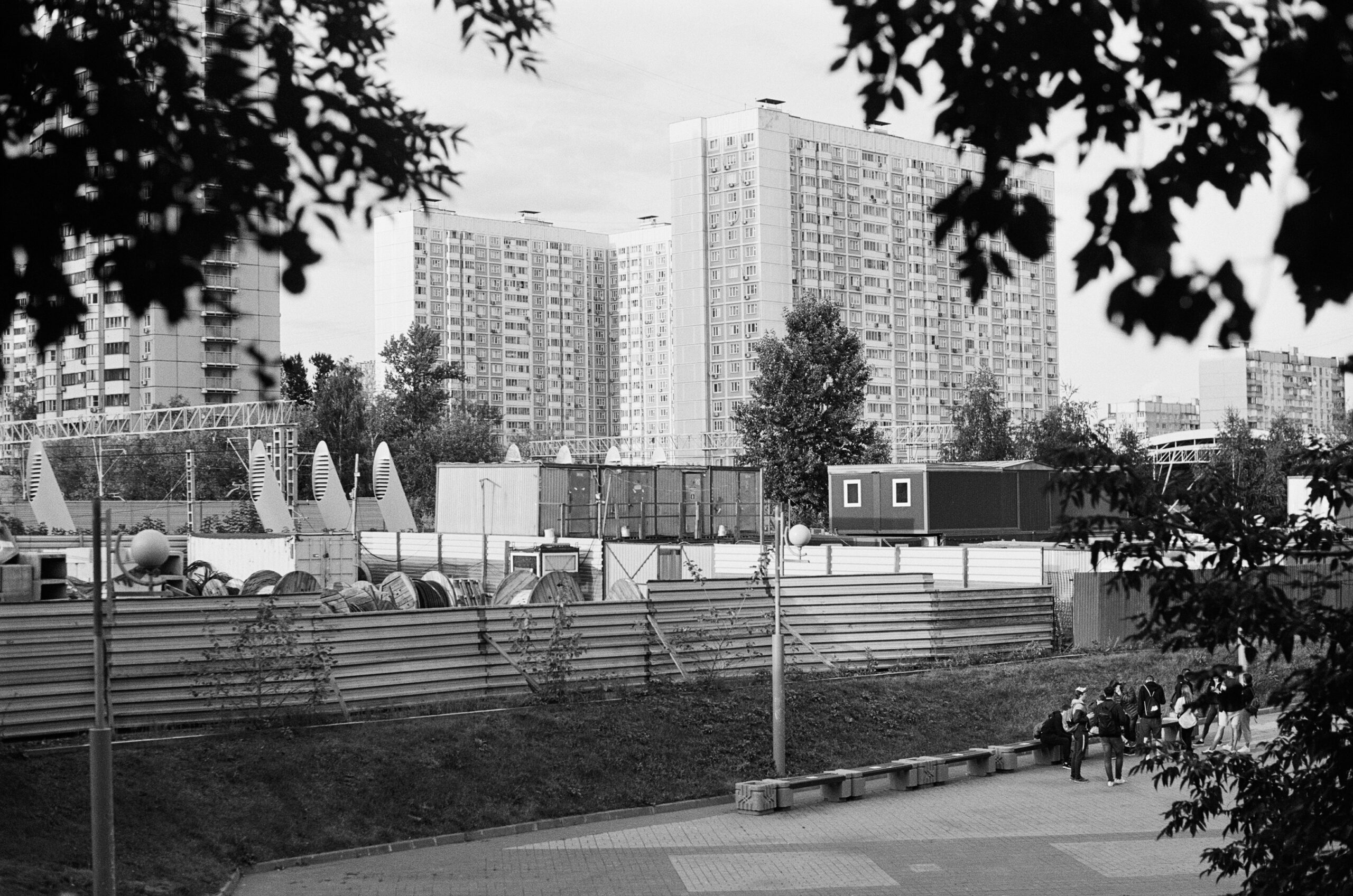 a black and white photo of a city with tall buildings